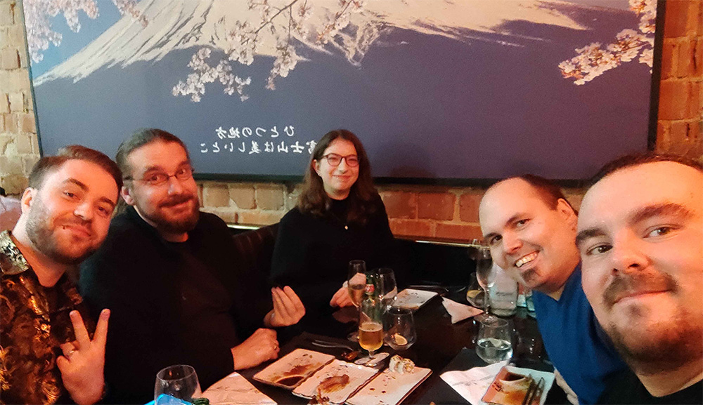 Über Uns - Teambild der Weihnachtsfeier